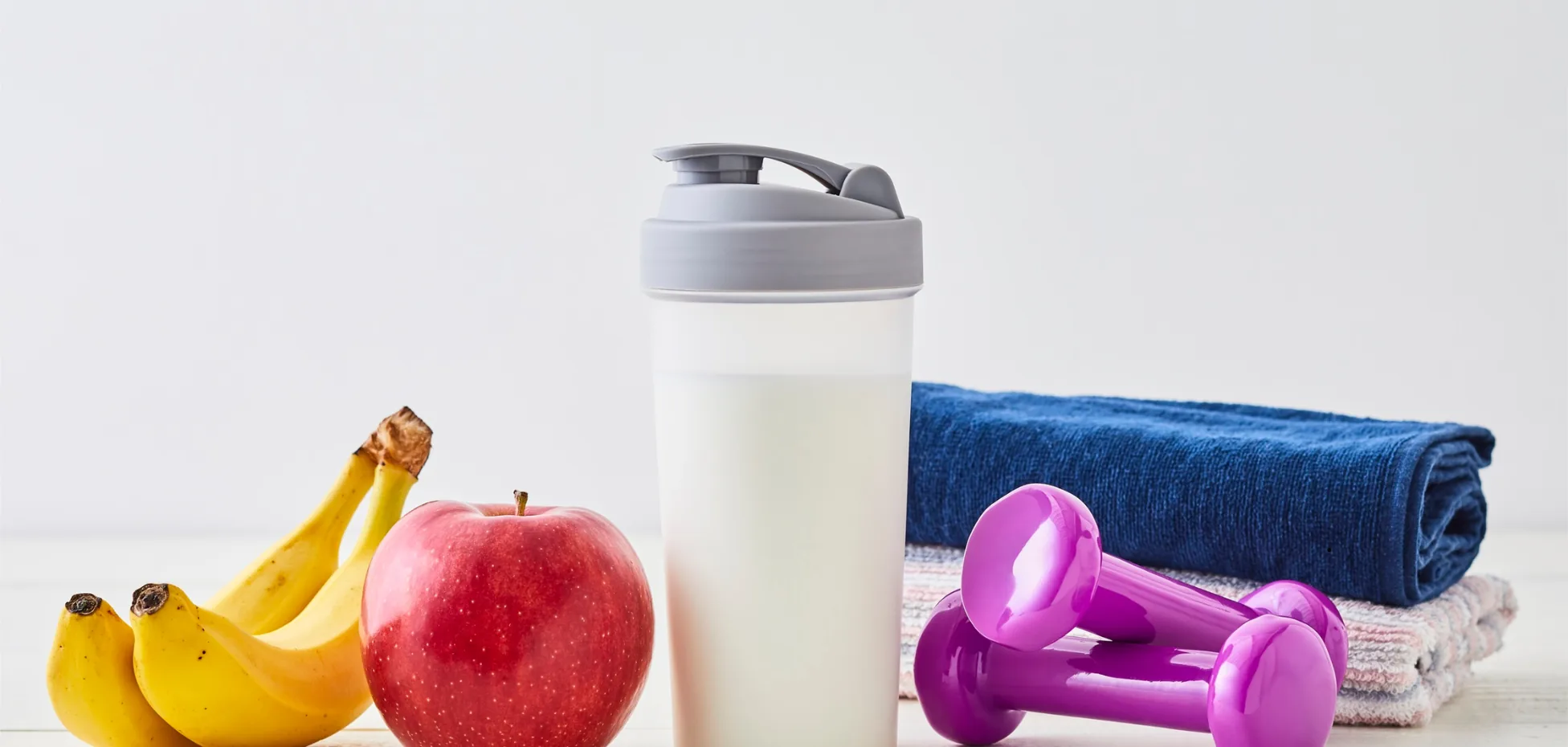 A healthy smoothie and fruits